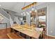 Bright dining area with wooden table and access to patio at 9295 Dunraven Loop, Arvada, CO 80007