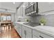 Kitchen with gas cooktop and marble countertops at 9295 Dunraven Loop, Arvada, CO 80007