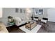 Inviting living room with a stylish couch, modern coffee table, and minimalist decor for a comfortable feel at 5873 S Prince St # 117C, Littleton, CO 80120