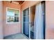 Patio features a sliding door access, an outdoor window, and an exterior wall at 5873 S Prince St # 117C, Littleton, CO 80120
