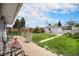 Lush backyard with a well-maintained lawn, perfect for outdoor activities and gatherings at 390 Yates St, Denver, CO 80219