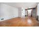 Spacious living room with hardwood floors, built-in shelves, and natural light at 390 Yates St, Denver, CO 80219