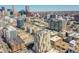 Scenic aerial image displaying the condo building amidst the cityscape with surrounding buildings and skyline at 300 W 11Th Ave # 8C, Denver, CO 80204