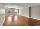 Spacious living room featuring gleaming hardwood floors and abundant natural light at 300 W 11Th Ave # 8C, Denver, CO 80204