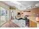 Inviting living room with wood floors, modern sofa, and access to the balcony at 5550 W 80Th Pl # 23, Arvada, CO 80003