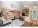 Bright open living space features a modern sectional sofa and charming decor at 5550 W 80Th Pl # 23, Arvada, CO 80003