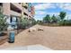 Enclosed community dog park with waste station and gravel surface at 20 Wilcox St # 316, Castle Rock, CO 80104