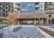 Beautiful entrance to an apartment complex with brick and stone, enhanced by modern architectural design at 20 Wilcox St # 316, Castle Rock, CO 80104