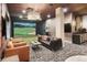 Golf simulator in lounge area with large screen and comfortable seating at 20 Wilcox St # 316, Castle Rock, CO 80104