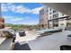 Patio area showcasing the grill, seating, and elevated hot tub spa at 20 Wilcox St # 316, Castle Rock, CO 80104