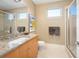 Guest bathroom with shower and granite vanity at 402 Garfield St, Denver, CO 80206