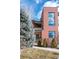 Modern brick home with a balcony and well-maintained landscaping at 402 Garfield St, Denver, CO 80206