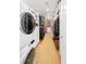 Bright laundry room with ample storage and modern washer and dryer at 402 Garfield St, Denver, CO 80206