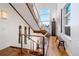 Elegant staircase with wood and metal accents, showcasing a unique art collection at 402 Garfield St, Denver, CO 80206