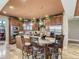 Spacious kitchen with a center island, stainless steel appliances, and custom cabinetry, providing ample storage and workspace at 12745 Uinta St, Brighton, CO 80602