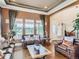 Comfortable living room with hardwood floors, large windows, and a cozy seating area, creating an inviting atmosphere at 12745 Uinta St, Brighton, CO 80602