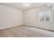 Finished basement bedroom with carpeted floor and window at 3254 Boral Owl Dr, Brighton, CO 80601