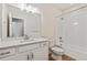 Basement bathroom with white vanity, bathtub, and tile flooring at 3254 Boral Owl Dr, Brighton, CO 80601