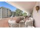 Inviting balcony with comfortable seating offers a relaxing outdoor living space with neighborhood views at 1250 N Humboldt St # 201, Denver, CO 80218