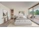 Comfortable bedroom showcasing a serene view and decor, filled with natural light, promoting peaceful relaxation at 1250 N Humboldt St # 201, Denver, CO 80218