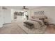 Sunlit bedroom boasts ample closet space and a ceiling fan with a view of the sliding glass doors at 1250 N Humboldt St # 201, Denver, CO 80218