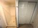 Bright shower featuring glass doors and a tiled interior for a modern and clean look at 7255 E Quincy Ave # 309, Denver, CO 80237