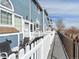 Townhome with outdoor seating on walkway at 8199 Welby Rd # 1102, Denver, CO 80229