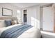 Comfortable bedroom featuring a cozy bed with stylish bedding and ample natural light at 23731 E 40Th Ave, Aurora, CO 80019