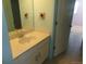 Small bathroom with vanity and light teal walls at 1153 Elbridge Dr, Elizabeth, CO 80107