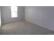 Simple bedroom with grey walls and carpet flooring at 1153 Elbridge Dr, Elizabeth, CO 80107