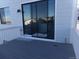 Gray composite deck with sliding glass doors at 1153 Elbridge Dr, Elizabeth, CO 80107
