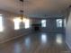 Spacious dining room with hardwood floors and a chandelier at 1153 Elbridge Dr, Elizabeth, CO 80107
