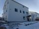 Two-story house with rear deck and snowy landscape at 1153 Elbridge Dr, Elizabeth, CO 80107
