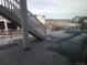 Back patio features concrete flooring and steps to the yard at 1153 Elbridge Dr, Elizabeth, CO 80107