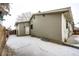 Exterior view of home showing backyard with patio at 4274 S Fundy Way, Aurora, CO 80013