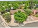 Aerial view of home showcasing lush, green surroundings and mature trees at 797 W Briarwood Ave, Littleton, CO 80120