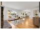 Bright living room with hardwood floors, fireplace, and large windows offering natural light at 797 W Briarwood Ave, Littleton, CO 80120