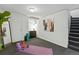 Finished basement space with neutral carpet, storage, and potential for a home gym or recreation area at 2955 N Columbine St, Denver, CO 80205