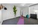 Finished basement space with neutral carpet, storage, and potential for a home gym or recreation area at 2955 N Columbine St, Denver, CO 80205