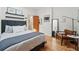 Serene bedroom with hardwood floors and stylish decor at 2955 N Columbine St, Denver, CO 80205