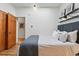 Bedroom with hardwood floors, stylish artwork, and a cozy atmosphere at 2955 N Columbine St, Denver, CO 80205