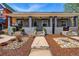 Charming bungalow with a landscaped front yard and inviting covered porch at 2955 N Columbine St, Denver, CO 80205