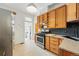 Well-lit kitchen features wood cabinets, stainless steel appliances, and a bright open layout at 2955 N Columbine St, Denver, CO 80205