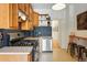 Functional kitchen with stainless steel appliances, ample cabinet space and bar seating at 2955 N Columbine St, Denver, CO 80205