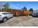 Ample parking area with access to the house and a silver car at 2955 N Columbine St, Denver, CO 80205