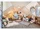 Bright attic space filled with art supplies, paintings, and creative inspiration at 33 L Rd, Golden, CO 80403