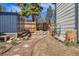 View of backyard with storage shed and rustic stone accents at 33 L Rd, Golden, CO 80403