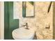 Bathroom featuring a decorative backsplash and sink at 33 L Rd, Golden, CO 80403