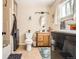 Bright bathroom features tile floors, wood vanity, and washer and dryer at 33 L Rd, Golden, CO 80403
