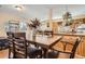 Eat-in kitchen features wood cabinets, an island and lots of natural light at 33 L Rd, Golden, CO 80403